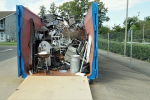 Roll-off container filled with scrap metal